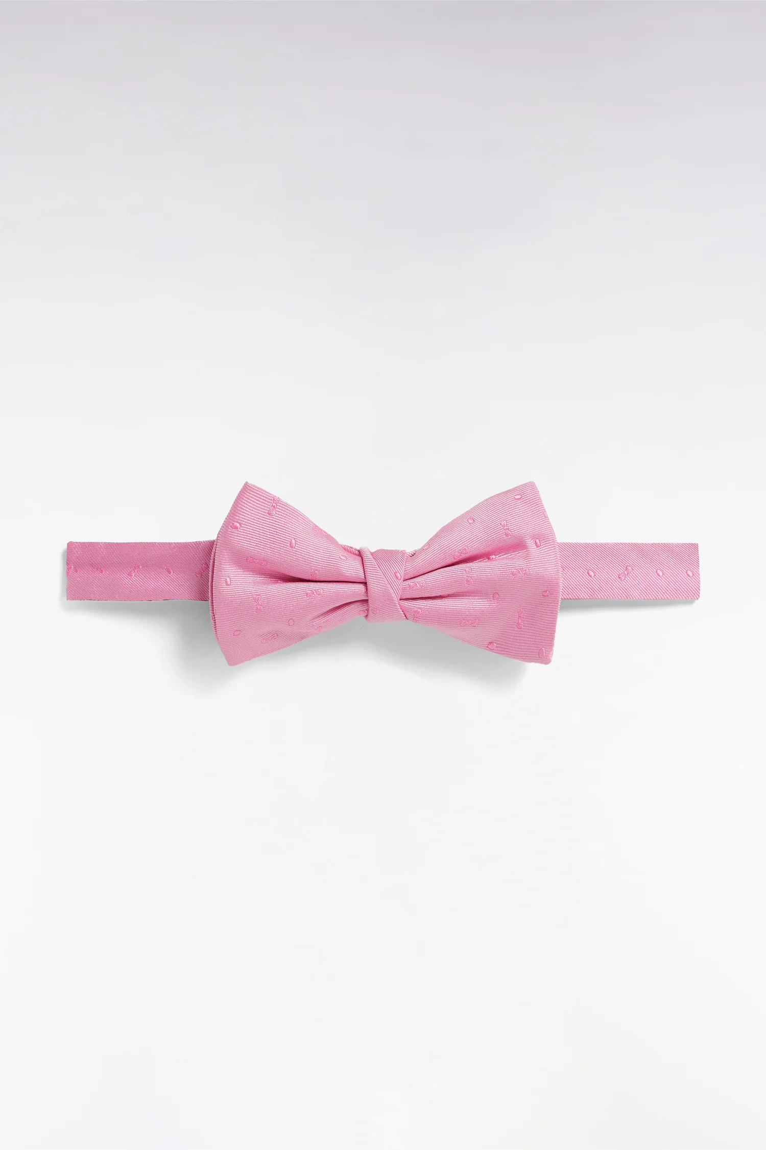 Noeud papillon en soie rose Ă micromotifs